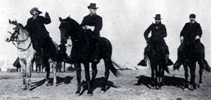 Brigadier General Nelson A. Miles and William F. "Buffalo Bill" Cody view the Lakota encampment near the Pine Ridge Agency on January 16, 1891. (National Archives)