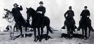 Brigadier General Nelson A. Miles and William F. "Buffalo Bill" Cody view the Lakota encampment near the Pine Ridge Agency on January 16, 1891. (National Archives) 