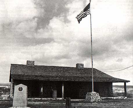 Photo of a reconstructed stone officer's house is all that remains of Fort Mason taken by Charles M. Robinson, III from the book, Frontier Forts of Texas